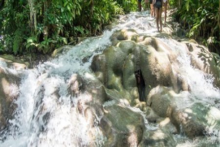 People walking along famous river fall